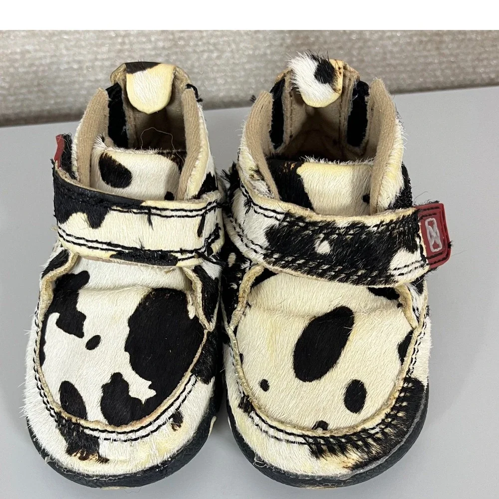 Twisted X Kids Cow Print Moccasins in Black and White